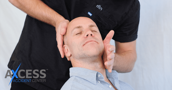 chiropractor adjusting someones neck